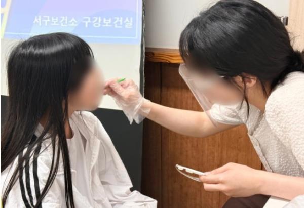 구덕청소년수련관 방과후아카데미, 서구보건소와 연계한 구강교육 진행 기사 이미지