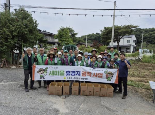 포천시 소흘읍 새마을 남녀 지도자, 감자 심기 행사 기사 이미지